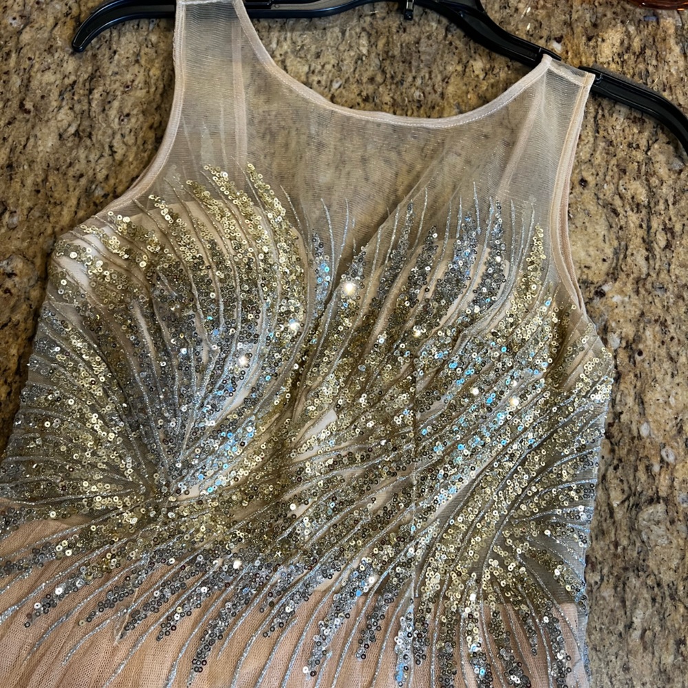 Champagne prom/homecoming dress!! Super cute, with a slit. Dress is for 5'2".